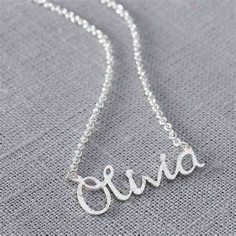 silver name necklace.